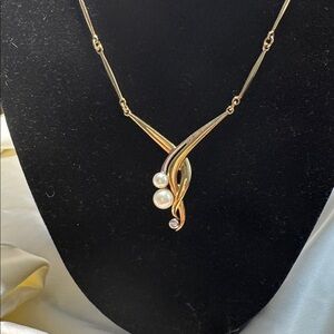 Elegant Gold and Silver Necklace with Pearl Accents